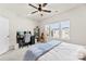 Bright bedroom featuring a cozy bed, a dedicated workspace, and ample natural light at 3748 Ellington St, Charlotte, NC 28211