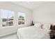 Bedroom featuring 2 windows and neutral-toned decor and carpet at 3748 Ellington St, Charlotte, NC 28211