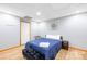 Cozy bedroom with light-colored walls, wood-look flooring, and a comfortable place to rest after a long day at 4120 Lake Shore S Rd, Denver, NC 28037