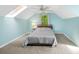Slanted ceiling bedroom with a skylight and large window letting in natural light at 4120 Lake Shore S Rd, Denver, NC 28037