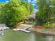 Lakefront home with private boat dock and waterfront access, blending natural beauty with convenient lakeside living at 4120 Lake Shore S Rd, Denver, NC 28037