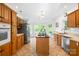 Eat-in kitchen boasts an island, stainless steel appliances, and lots of natural light at 4120 Lake Shore S Rd, Denver, NC 28037