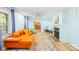 Inviting living room with a modern sofa, colorful rug, and cozy fireplace at 4120 Lake Shore S Rd, Denver, NC 28037