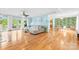Open floor plan with hardwood floors seamlessly connects the living and dining areas at 4120 Lake Shore S Rd, Denver, NC 28037