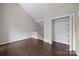Spacious bedroom with hardwood floors and ample closet space at 415 W 7Th St # H, Charlotte, NC 28202