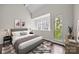 Bright bedroom with large windows and modern decor at 415 W 7Th St # H, Charlotte, NC 28202
