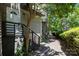 View of the front of the townhouse with a lovely walkway at 415 W 7Th St # H, Charlotte, NC 28202
