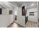 Cozy kitchenette with dark wood cabinetry and convenient access to the outdoor area at 415 W 7Th St # H, Charlotte, NC 28202