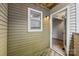 Outdoor patio with window and door leading to the interior at 415 W 7Th St # H, Charlotte, NC 28202