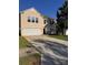Charming two-story home with a two-car garage and a well-maintained lawn on a sunny day at 4521 Palustris Ct, Charlotte, NC 28269