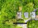 Aerial view of property showcasing lot lines, home, surrounding greenery, and neighborhood streets at 485 Lincoln St, Cramerton, NC 28032