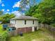 Aerial view of the backyard, featuring a partial fence and the home's exterior at 485 Lincoln St, Cramerton, NC 28032