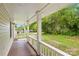 Covered front porch with views of the home's front yard at 485 Lincoln St, Cramerton, NC 28032