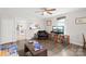 Bright living room showcasing a ceiling fan and hardwood floors at 485 Lincoln St, Cramerton, NC 28032