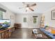 Living room with hardwood floors, ceiling fan and neutral-colored walls at 485 Lincoln St, Cramerton, NC 28032