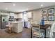 Bright kitchen featuring white cabinets, stainless steel appliances, a center island and a dining area at 577 Nesbe St # 2222, Lancaster, SC 29720