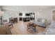 Open concept living room and kitchen with modern furnishings and plenty of space for entertaining at 577 Nesbe St # 2222, Lancaster, SC 29720