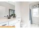 Bright bathroom showcasing a white vanity, modern fixtures, and a combination tub and shower at 6336 Busch Ave, Midland, NC 28107