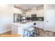 Modern kitchen with stainless steel appliances, white cabinetry, and sleek quartz countertops at 6336 Busch Ave, Midland, NC 28107