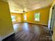 Spacious bedroom with hardwood floors, natural light, and neutral-colored walls, ready for personalization at 647 Mckay Hill Rd, Mount Gilead, NC 27306
