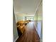 Bright and airy living room featuring hardwood floors, large windows, and a cozy seating area at 647 Mckay Hill Rd, Mount Gilead, NC 27306