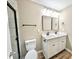 Bathroom with double vanity, modern fixtures, and glass-enclosed shower for a luxurious feel at 6756 Denver Heights Cir, Denver, NC 28037