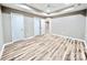 Spacious bedroom with wood flooring, neutral color palette, and recessed lighting at 6756 Denver Heights Cir, Denver, NC 28037