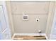 Neutral laundry room with washer/dryer hookups and wood-look flooring at 6756 Denver Heights Cir, Denver, NC 28037