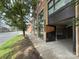 A view of the front of the building at 715 North Poplar Street on a sunny day at 715 N Church St, Charlotte, NC 28202