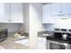 Updated kitchen featuring stainless steel appliances, granite counter tops and modern cabinets at 715 N Church St, Charlotte, NC 28202