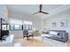Bright living room with comfortable seating, hardwood floors and large windows at 715 N Church St, Charlotte, NC 28202