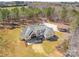 Aerial view of a large white home featuring a deck, a garage, and a long driveway at 722 Clegg Farm Dr, York, SC 29745