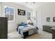 Cozy bedroom with natural light, bed, and gray furniture, perfect for relaxation at 722 Clegg Farm Dr, York, SC 29745