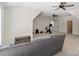 Spacious bonus room featuring exercise equipment, ceiling fans and a comfy couch at 722 Clegg Farm Dr, York, SC 29745