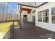 Spacious covered deck featuring a fireplace and an outdoor television at 722 Clegg Farm Dr, York, SC 29745