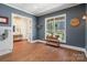 Open dining area featuring wood floors, with plenty of natural light, and neutral-colored walls at 722 Clegg Farm Dr, York, SC 29745