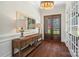 Elegant foyer featuring hardwood floors, a wooden console table, and a view to the exterior at 722 Clegg Farm Dr, York, SC 29745