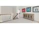Hallway with white walls, console table and framed sports jerseys at 722 Clegg Farm Dr, York, SC 29745