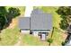 This aerial shot displays the rear of the house and its expansive lawn at 8701 W Dixie Dr, Charlotte, NC 28278