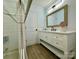 Bright bathroom with vanity and tiled shower at 8701 W Dixie Dr, Charlotte, NC 28278