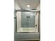 Bathroom featuring tub and shower with glass enclosure at 8701 W Dixie Dr, Charlotte, NC 28278