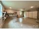 Spacious garage with shelving units and ample storage space at 8701 W Dixie Dr, Charlotte, NC 28278