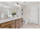 Modern bathroom with double sinks, white countertops, and a separate toilet room at Lot 003 Bozeman Ct # 3, Stanley, NC 28164