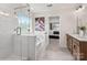 Bright bathroom featuring a soaking tub, a glass-enclosed shower, and a double sink vanity at Lot 003 Bozeman Ct # 3, Stanley, NC 28164