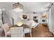 Inviting living room with wood floors, a fireplace, and a view of the staircase at Lot 003 Bozeman Ct # 3, Stanley, NC 28164