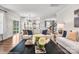 Open concept living room connected to the kitchen offers a spacious and inviting atmosphere at Lot 003 Bozeman Ct # 3, Stanley, NC 28164