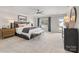 Spacious main bedroom with a ceiling fan, a sitting bench, and a large window view at Lot 003 Bozeman Ct # 3, Stanley, NC 28164