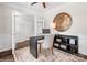 Stylish office space featuring a desk, shelving, large clock and neutral color palette, creating a productive and inviting atmosphere at Lot 003 Bozeman Ct # 3, Stanley, NC 28164