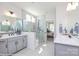 Bright bathroom with a double vanity, tile flooring, and a glass-enclosed shower at Lot 29 Bozeman Ct # 29, Stanley, NC 28164