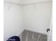 This walk-in closet has gray carpet, white walls, and a wire shelving unit at Lot 29 Bozeman Ct # 29, Stanley, NC 28164
